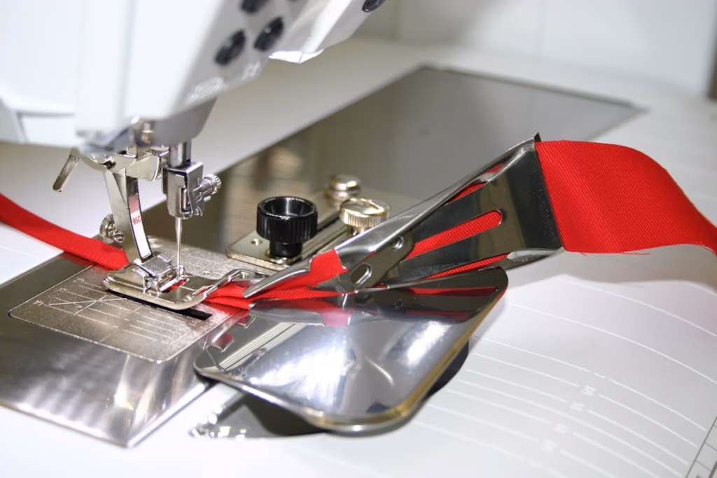 Shop BERNINA #88 28mm Binder Attachment for sewing projects buy now